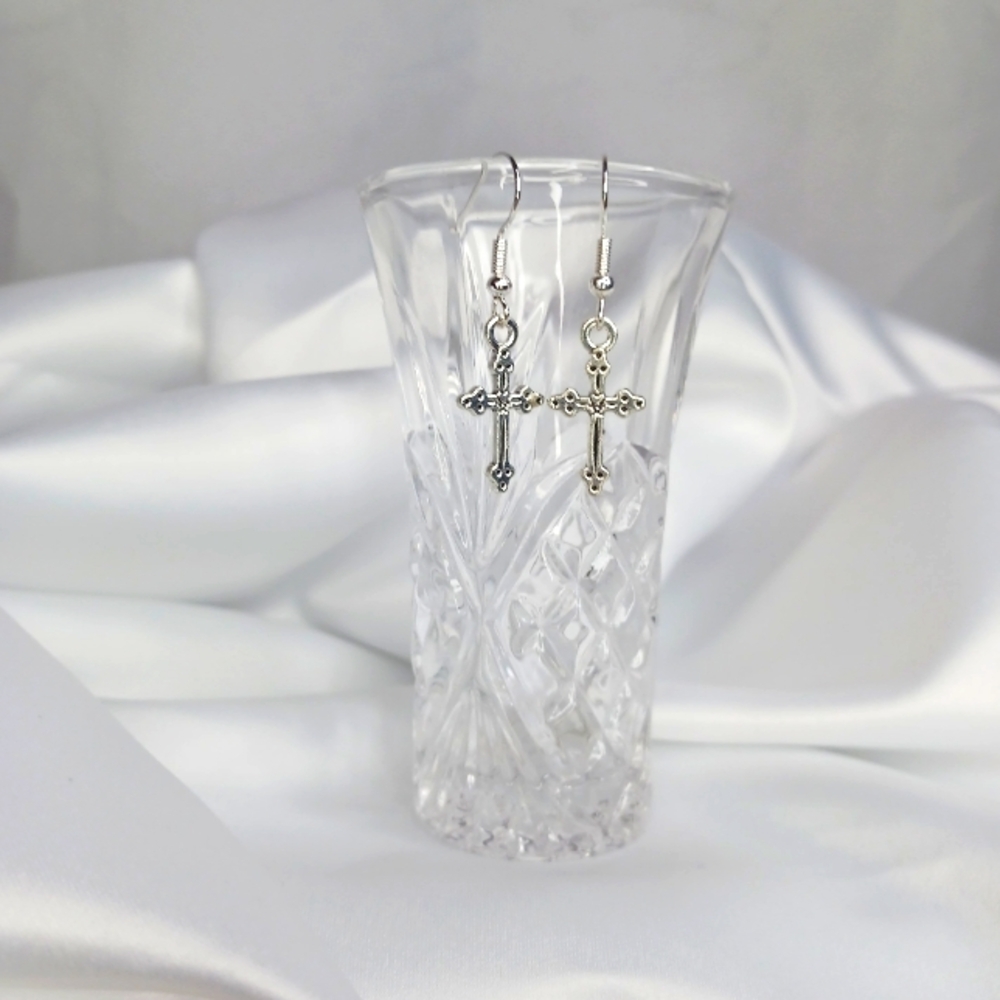 Silver Thin Ornate Cross Earrings.